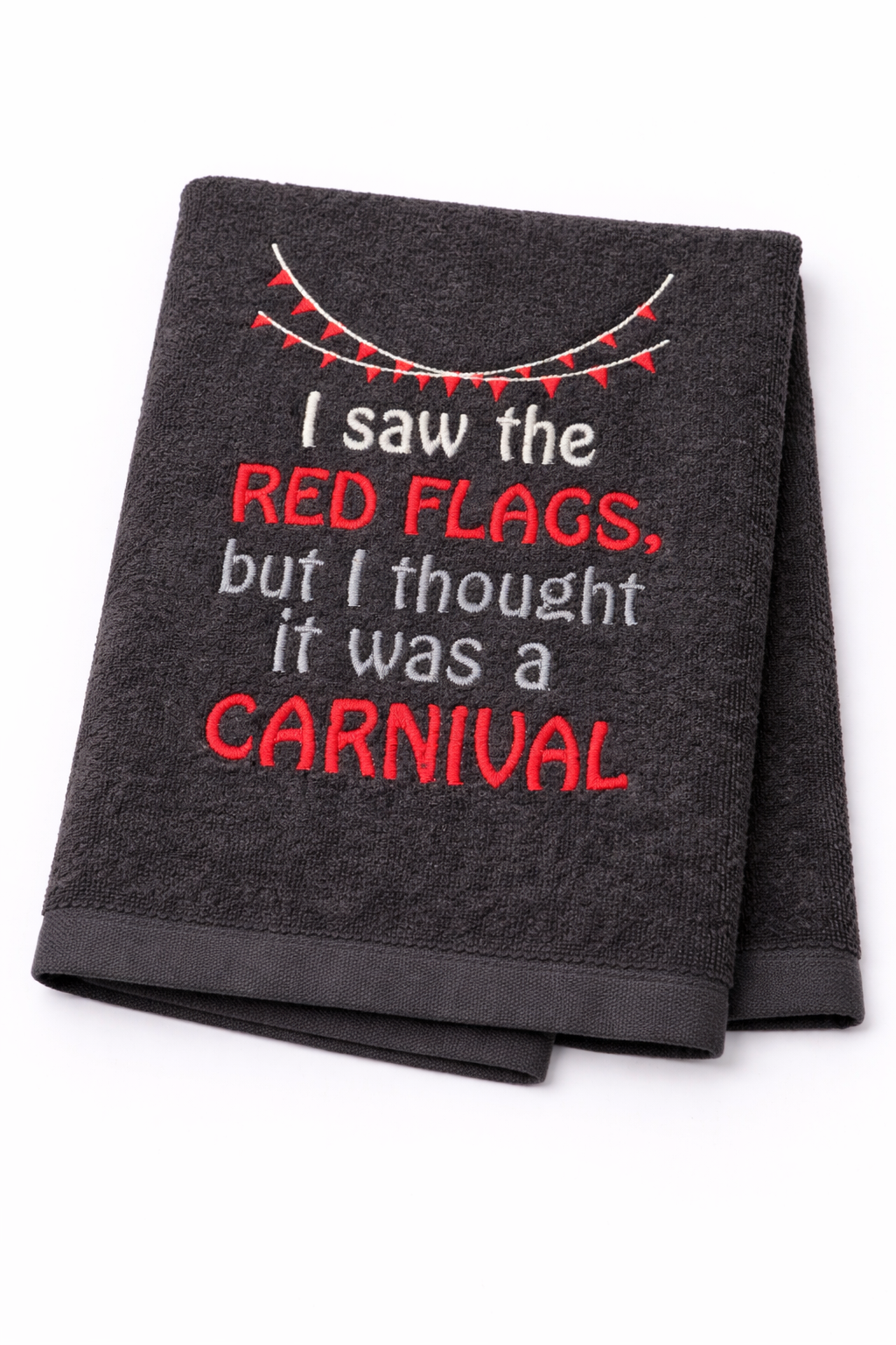 Gray towel with red and white text on a white background